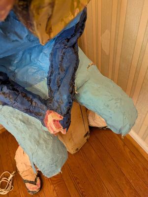 Paper Mache Young Lady Sitting On A Vintage Suitcase by Artist Nancy Hayes Winston Salem, NC