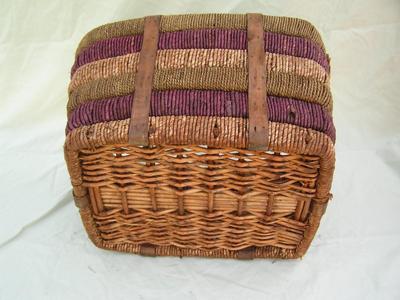 Very sturdy wicker basket wrapped in cordage.