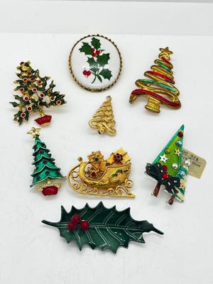 LOT: 191J: Christmas Brooch Lot: Avon, AJMC and More