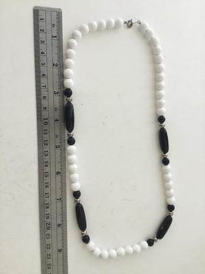 Unmarked white and black beaded fashion necklace