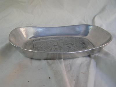 “Give Us This Day Our Daily Bread”.Small aluminum bread tray