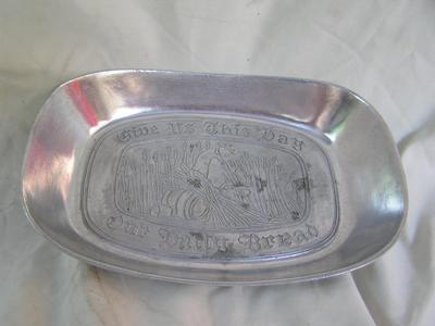 “Give Us This Day Our Daily Bread”.Small aluminum bread tray