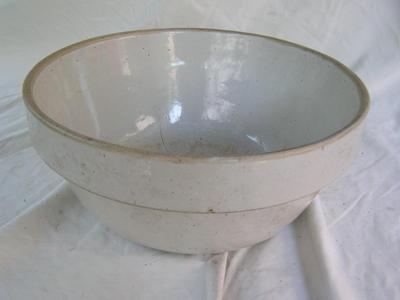 Big ol’ “stoneware” bowl. 11" I.D at top x 5-1/2" deep. Maybe antique??