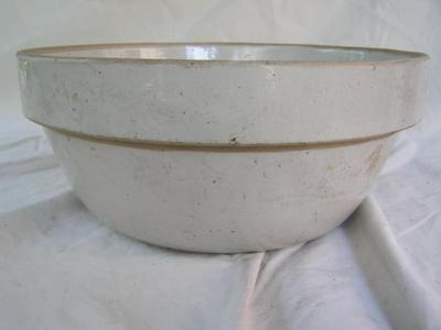 Big ol’ “stoneware” bowl. 11" I.D at top x 5-1/2" deep. Maybe antique??