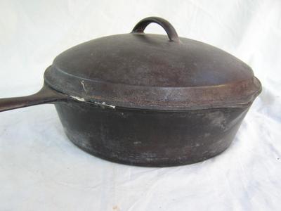 Vintage cast iron deep covered skillet OR maybe Dutch oven?