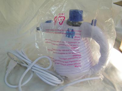 Portable hand held steam cleaner. Appears new in box/unused
