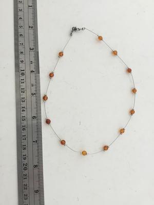 Silver tone unmarked orange beaded choker necklace