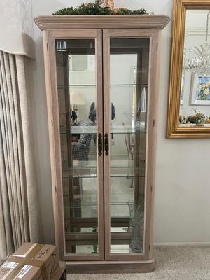 Sale Photo Thumbnail #40: Light Oak Wood construction. Double door front.  Measures 76" tall x 32" wide x 12" deep.  4 Glass shelves, lighted inside. Great condition. Pickup will be arranged from very local home in Brea.