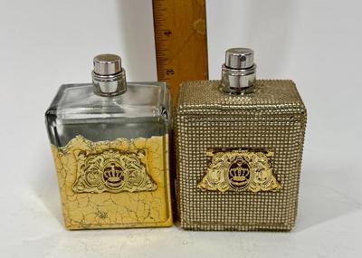 Sale Photo Thumbnail #218: Viva La Juicy Limited Edition 3.4oz Parfum Spray with gold beaded glass bottle (still contains some perfume), and another Viva La Juicy Limited Edition 3.4oz Parfum Spray with gold gilt glass bottle (worn/crackled finish), that one appears to be empty.