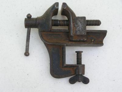 Miniature vise. Clamp to table top or counter top