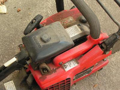 Shindaiwa chain saw. Maybe an 18" bar. NOT tested but looks operable