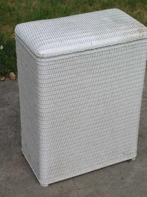 A clothes hamper, it’s solid