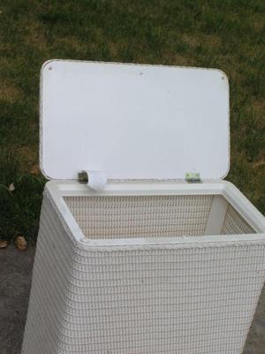 A clothes hamper, it’s solid