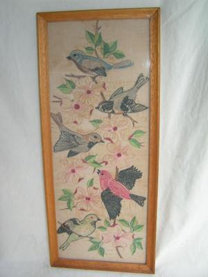 A pair of hand embroidered on cloth wall decor items
