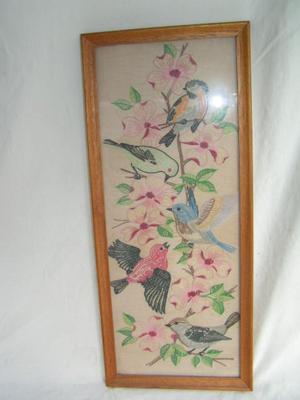 A pair of hand embroidered on cloth wall decor items