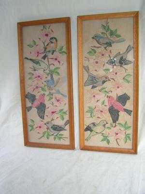 A pair of hand embroidered on cloth wall decor items