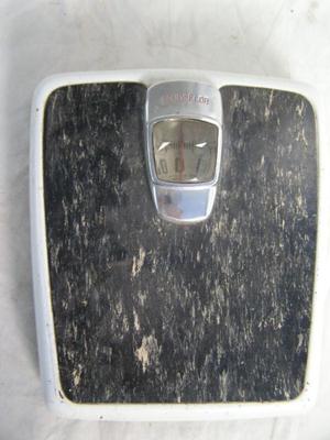 Mechanical bathroom scale. All metal construction. Weighed me about right