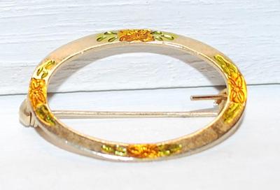 Engraved ORANGE & GREEN Flowers BROOCH (1¼" Diam.) on an Oval Gold Tone Setting