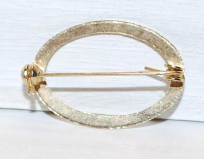 Engraved ORANGE & GREEN Flowers BROOCH (1¼" Diam.) on an Oval Gold Tone Setting