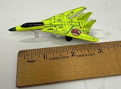 Sale Photo Thumbnail #308: Bright optic green and polished silver, good condition. Approx. 3" long.