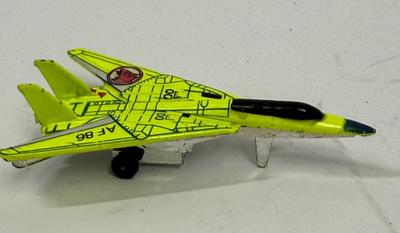 Sale Photo Thumbnail #303: Bright optic green and polished silver, good condition. Approx. 3" long.