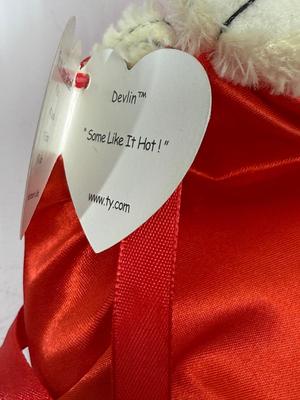 Sale Photo Thumbnail #439: In good condition. One devil is missing it;s ear tag.