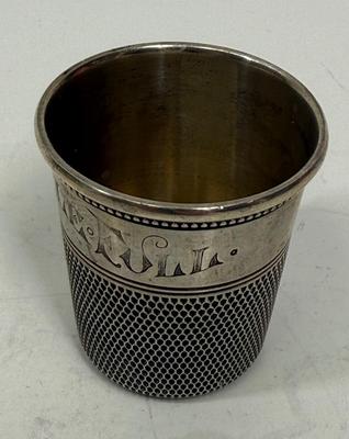 Sale Photo Thumbnail #459: In good condition, marked sterling along rim design. Approx. 1-7/8" tall.