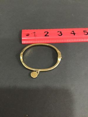 Very nice gold tone hinged bracelet