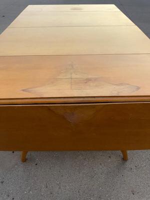 Haywood Wakefield Drop leaf table with leaves, there is damage