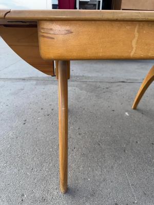 Haywood Wakefield Drop leaf table with leaves, there is damage