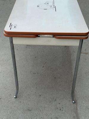 Vintage metal table with a drawer and pull out leaves