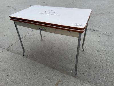 Vintage metal table with a drawer and pull out leaves