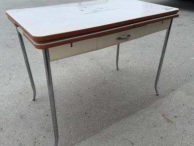 Vintage metal table with a drawer and pull out leaves