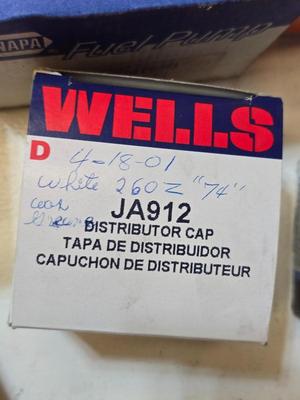 Lot of Vintage Auto Parts – Spark Plug Wires, Fuel Pump, Caliper Kit, Distributor Caps & More Many marked for 260 Z