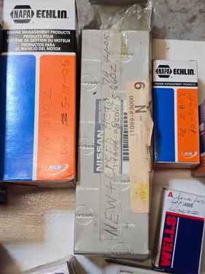 Lot of Vintage Auto Parts – Spark Plug Wires, Fuel Pump, Caliper Kit, Distributor Caps & More Many marked for 260 Z