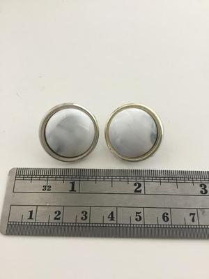 White round unmarked clip on vintage earrings