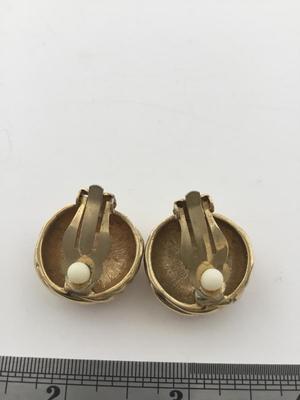 Gold tone clip on round earrings