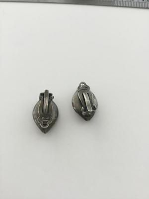 Silver tone vintage clip on earring