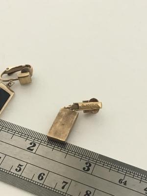Vintage Avon. Marked clip on gold tone earrings