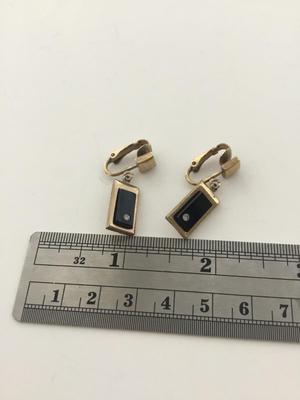 Vintage Avon. Marked clip on gold tone earrings