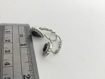 Silver tone unmarked black center earrings