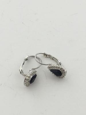Silver tone unmarked black center earrings