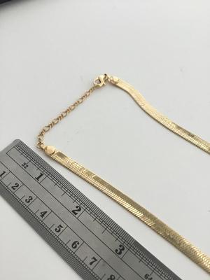 Gold tone chain like necklace