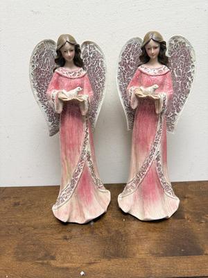 Sale Photo Thumbnail #61: In pink & white gowns, holding a dove. Good condition. Approx. 16" tall. Battery powered lights in the angel wings.Tested, works as expected.