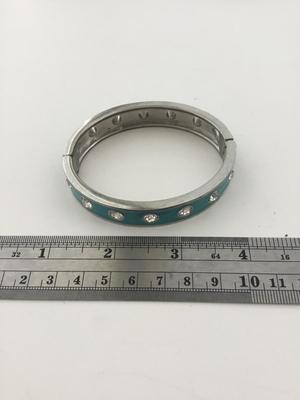 Silver tone light blue bangle bracelet
