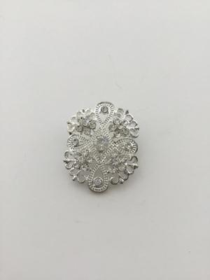Silver tone rhinestone brooch