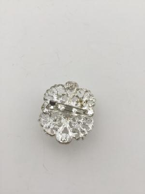 Silver tone rhinestone brooch