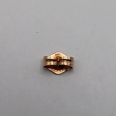 LOT 313: Gold-Tone Post Earrings with One 585/14K Back and One 14K Back