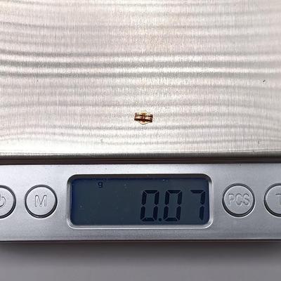 LOT 313: Gold-Tone Post Earrings with One 585/14K Back and One 14K Back