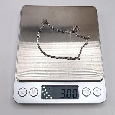 LOT 311: White Gold Stamped AU Ankle Bracelet 14KT, 9.5", TW 3.g